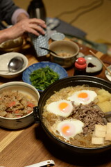 Sukiyaki modoki is thin beef slices mixed with different vegetables.