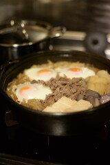 Sukiyaki modoki is thin beef slices mixed with different vegetables.