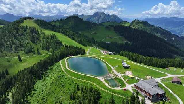 The man made lake with adventures awaiting holiday makers at Wagrainis Grafenberg