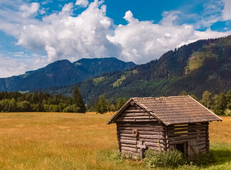Alpine summer view with a wooden hut near Lahntal, Maishofen, Zell am See, Salzburg, Pinzgau,...