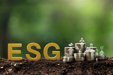 ESG environmental social governance business strategy investing concept.ESG wooden letter and stack coins with ESG icons. investment sustainable organizational development. account the environment. - obrazy, fototapety, plakaty