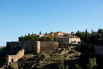 Obraz premium Cityscape from distance to the old city of Toledo, Spain