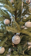 Obraz na płótnie Canvas Christmas background pine green tree with toys and garlands