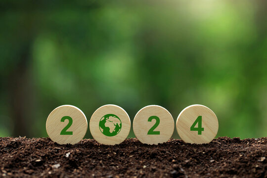 2024 New Year concept. Wooden cube with the word 2024 and green