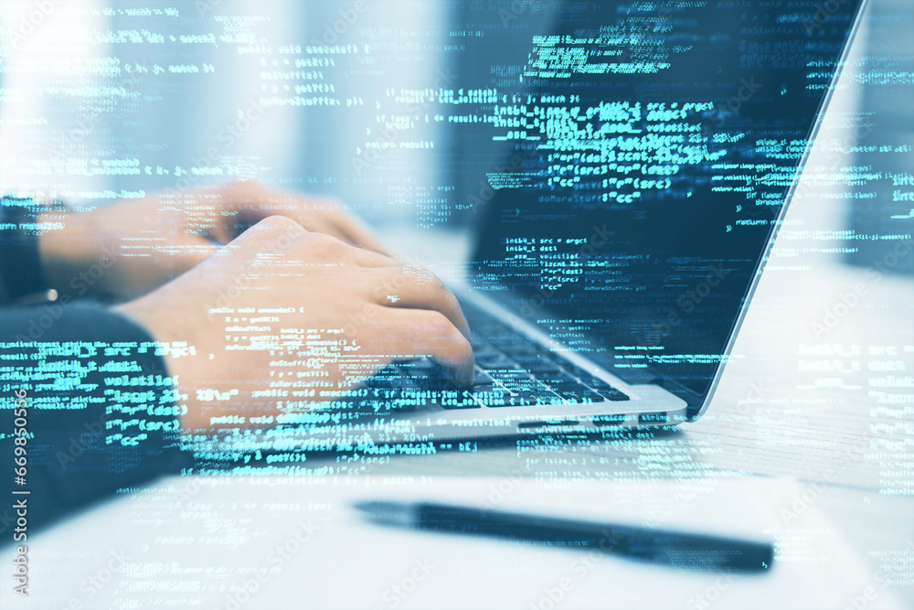 Poster Close up of male hands using laptop keyboard on desk with pen and creative coding html language on blurry background. Web developer and programming concept. Double exposure.