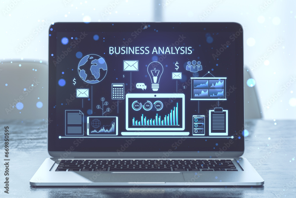 Poster close up of laptop with financial data and accounting hologram with devices and charts on blue backg