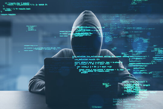 Hacker at desk using laptop with creative coding html language on blurry office interior background. Web developer, hacking, malware and programming concept. Double exposure.