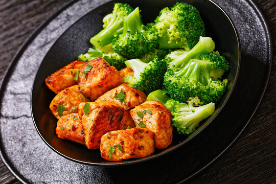 fried salmon bites with steamed broccoli florets