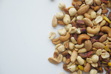 close up of many mixed nuts 