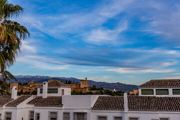 Alhambra as seen over the roofs of the buildings in Granada, Andalusia, Spain