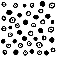 Pattern of rings, circles and dots in black on a white background