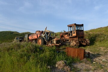 Fototapeta premium An old abandoned vehicle on Askold Island in Peter the Great Bay. Primorsky Krai