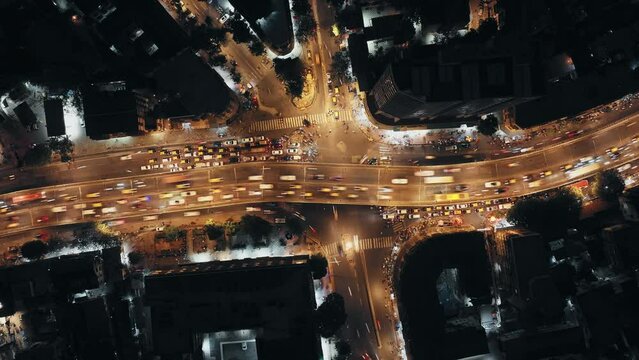 Aerial Timelapse view of Mumbai city at night Dadar, Parel, Prabhdevi, Lalbuag Roads. beautiful modern buildings, bright glowing lights, and roads.