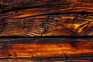 Surface of the old plank texture eroded by time and caries