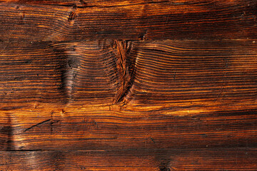 Surface of the old plank texture eroded by time and caries