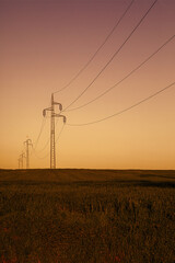 Electric pylons at sunset sky.
- 669882966