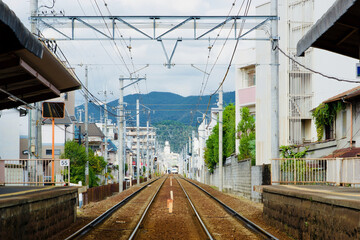 Naklejka premium The railroad tracks are straight with no curves.
