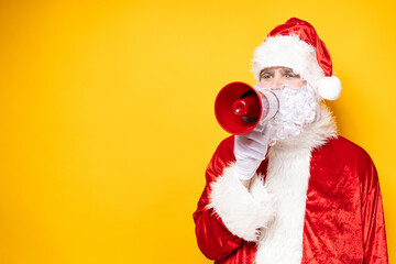 Santa Claus, with a megaphone in his hands.