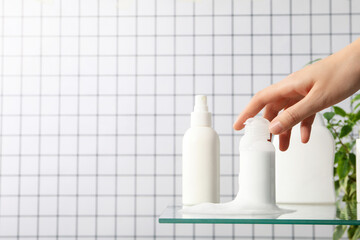 Hygiene products in the bathroom on a light background