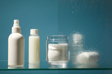Hygiene products on the shelf in the bathroom