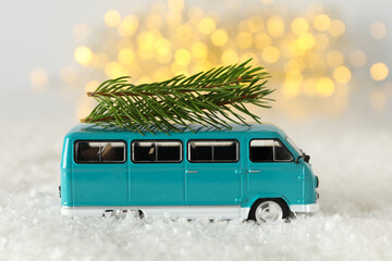 A car with a Christmas tree and New Year's decor.