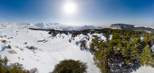 Aerial panorama of Mount Lebanon and cedar forest in winter. Drone view of Mount Lebanon mountain...