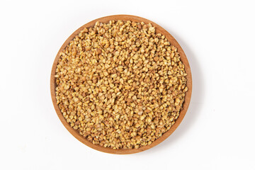 dry buckwheat isolated on white background.