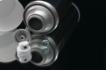 Aerosol can showing component parts of aerosol cans 