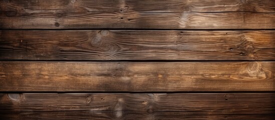 Antique wooden background with dark brown boards and a textured appearance