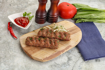 Kebab with beef served onion