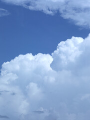 Naklejka na ściany i meble Blue sky and white clouds in summer