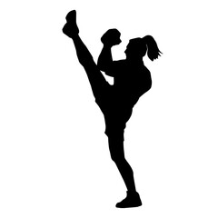Silhouette of a slim female doing martial art pose. Silhouette of a martial art woman in action pose.