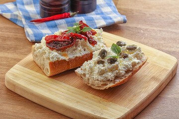 bruschetta with soft cheese capers and tomato