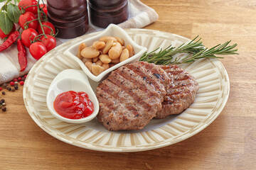 Grilled beef burger cutlet with sauce