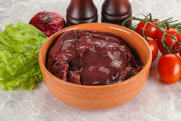Raw turkey liver in a bowl ready for cooking