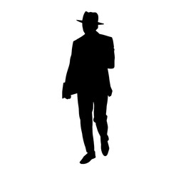 Silhouette of a gentleman in a suit costume wearing fedora hat. Silhouette of a man in suit.