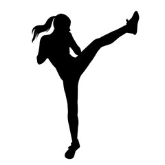 Silhouette of a woman doing a martial art kick. Silhouette of a sporty female doing kicking movement. - obrazy, fototapety, plakaty
