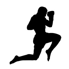 Silhouette of a kickboxer athlete in action pose. Silhouette of a sporty man doing kicking pose.