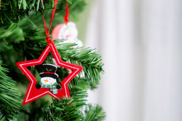Christmas star on the xmas tree background