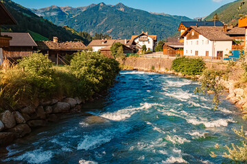 Fototapeta na wymiar Alpine summer view with the river Ahr at St Johann, San Giovanni, Ahrntal valley, Pustertal, Trentino, Bozen, South Tyrol, Italy