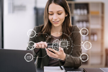 Businessman using a smartphone and laptop computer chatting with an intelligent artificial intelligence. Futuristic technology, automate Chat Bot, Smart Ai.