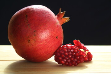 pomegranate on a black background