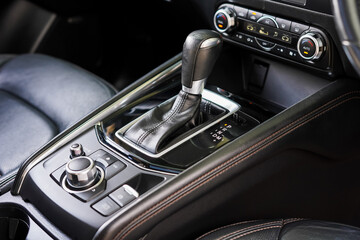 automatic transmission shift selector in the car interior. Closeup a manual shift of modern car...