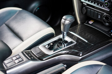 automatic transmission shift selector in the car interior. Closeup a manual shift of modern car...