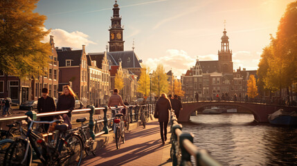 Bicycles lining a bridge over the canals of Amsterdam - obrazy, fototapety, plakaty