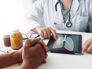 Medical and healthcare concept, Female doctor explaining lung infection symptoms to male patient....