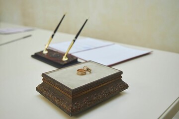 Wedding rings on a beautiful stand in the registry office. Wedding Day