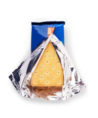 Soda cracker stack closeup, large detailed isolated square crisp whole grain saltine crackers macro closeup, military field ration MRE concept, gentle shadows, perforations, saltines flat lay detail