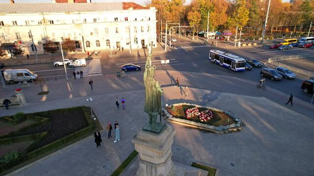 Aerial panoramic drone view of central park with statue of Stefan cel Mare in center of Chisinau, on a sunny autumn day, Moldova. Stefan Great was Prince of Moldavia between 1457 and 1504. 4K video