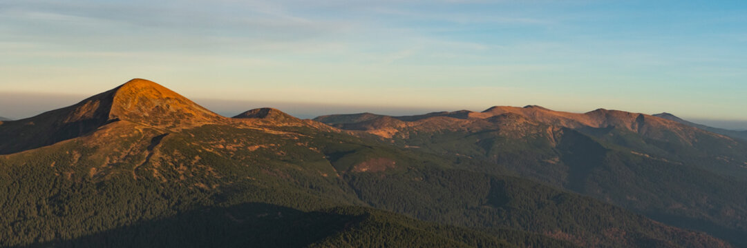 Banner photo of mountain hills, Carpathian mountains ridges landscape. Mount Hoverla or Goverla, Montenegrin ridge, Ukraine.